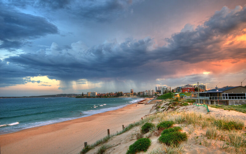 Stormy beach at sunset