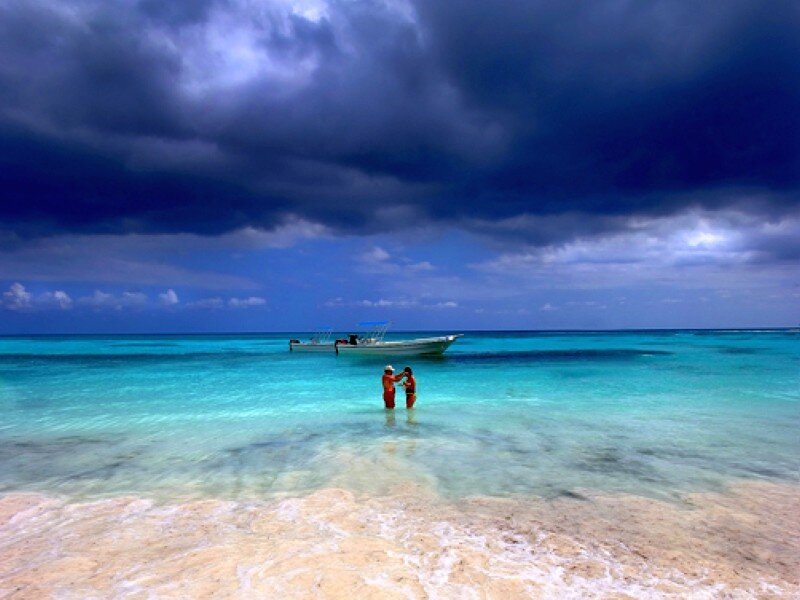 Stormy beach with boat