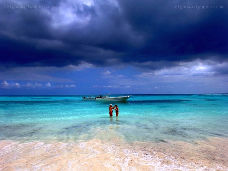Stormy beach with boat