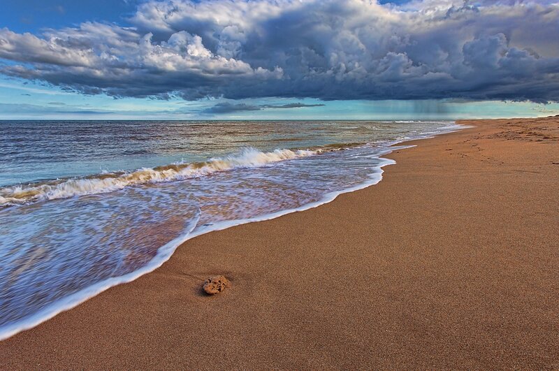 Stormy beach with crashing waves