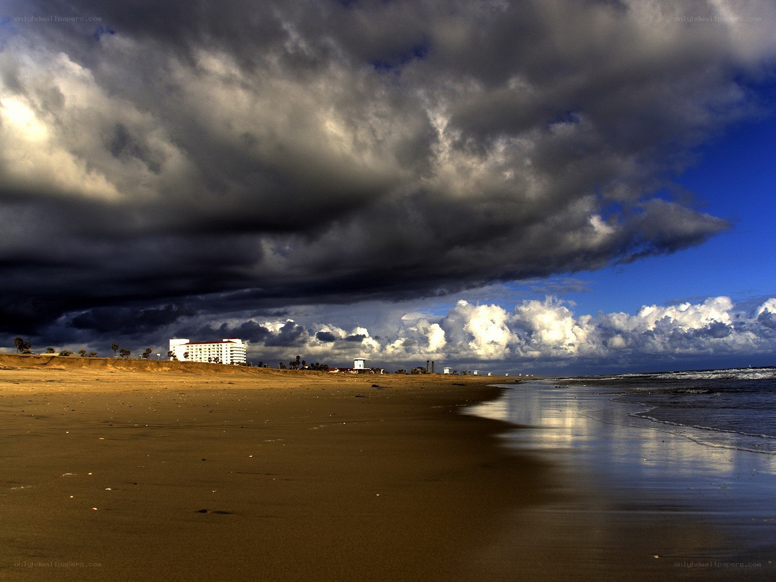Stormy beach with hotel