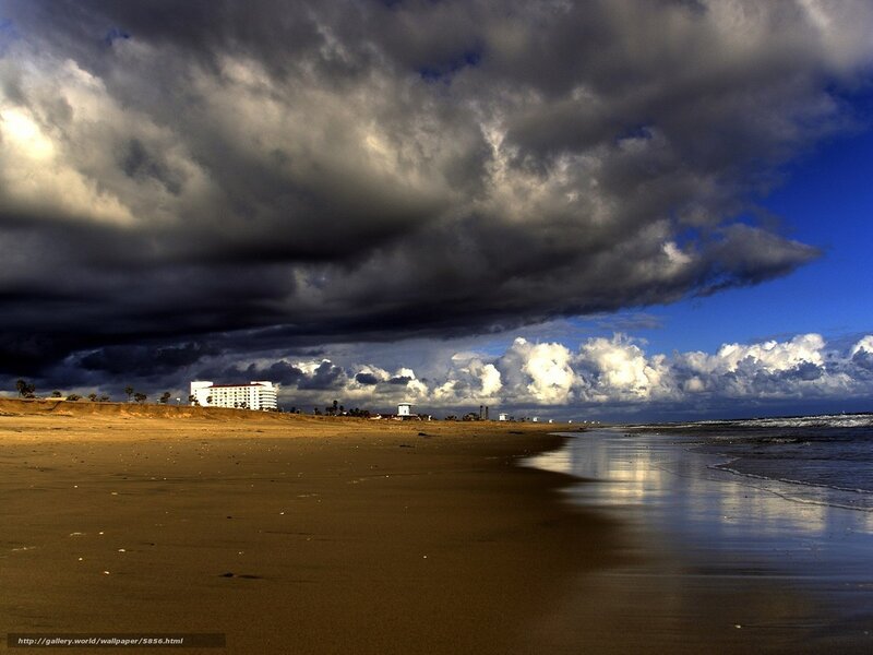 Stormy beach with hotel