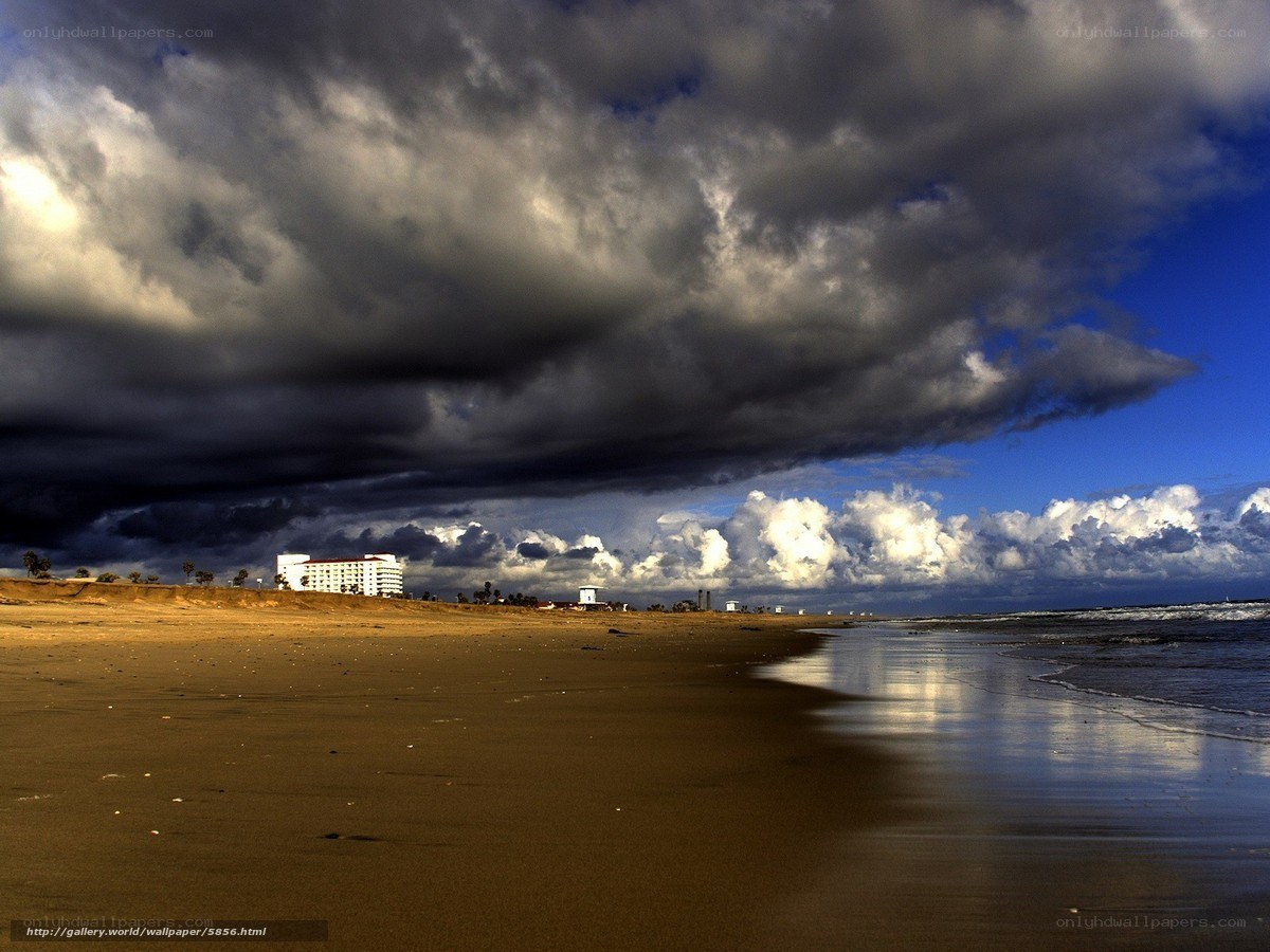 Stormy beach with hotel