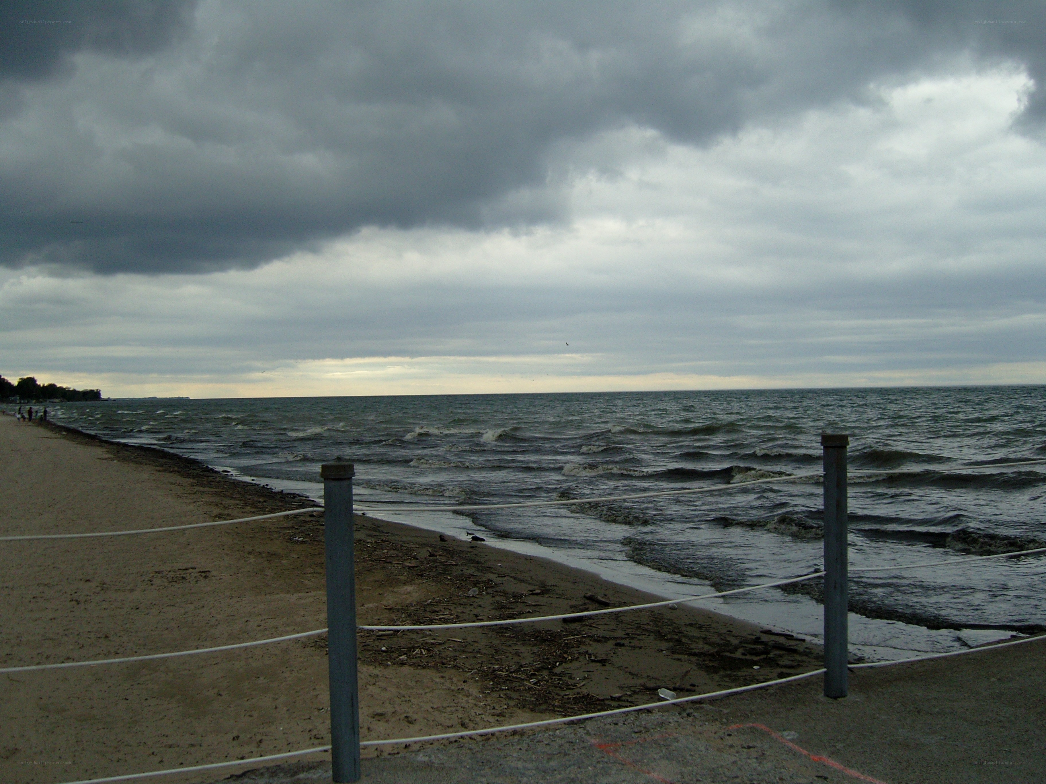 Stormy beach with overcast sky