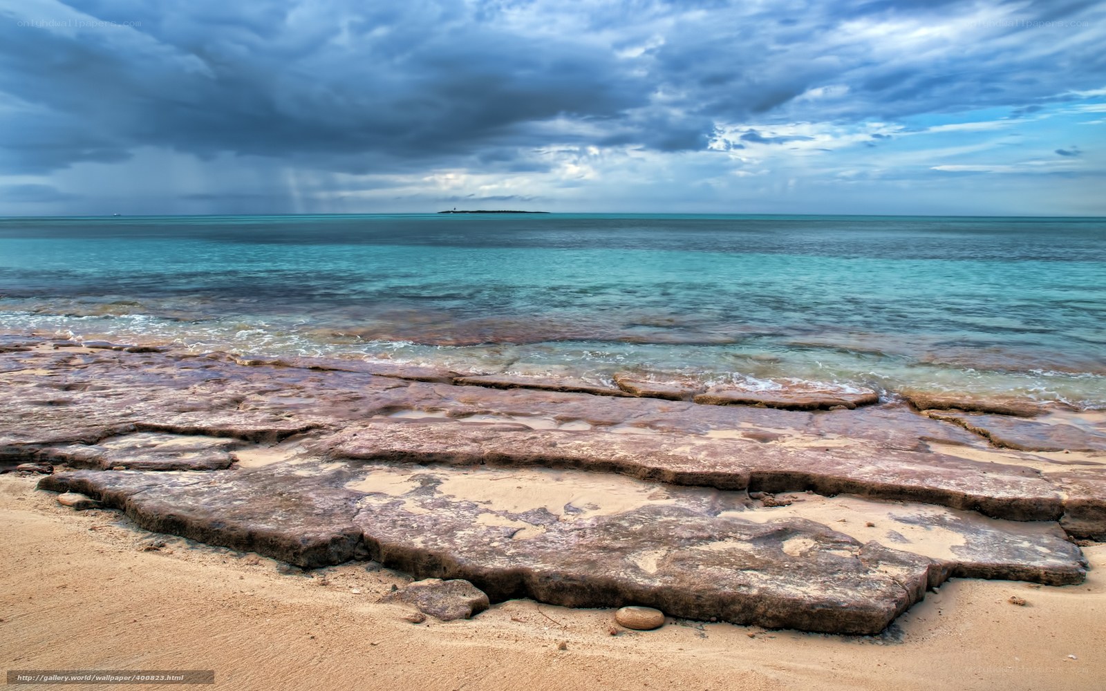 Stormy beach with rocky shore