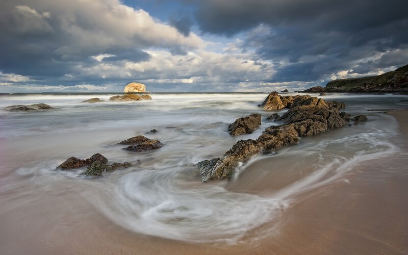 Stormy beach with sea stacks
