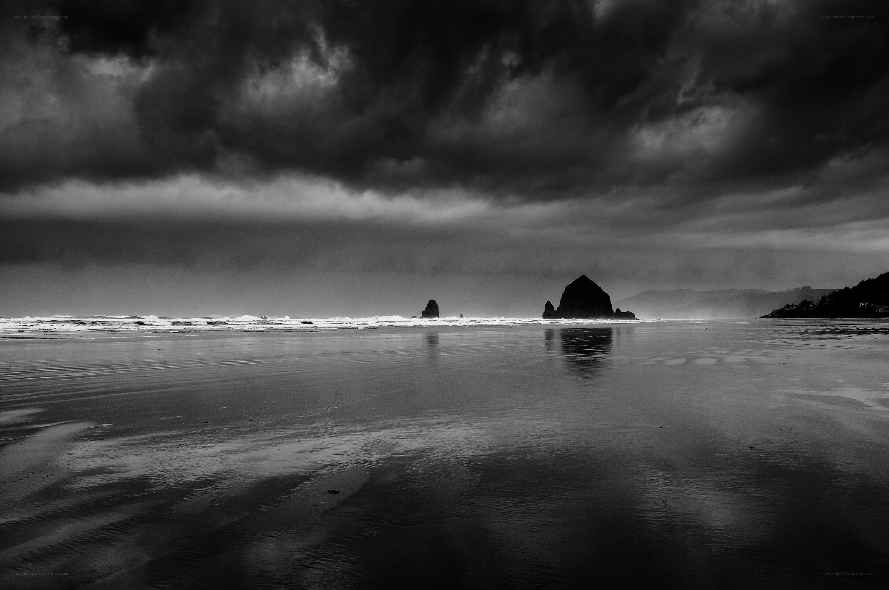 Stormy beach with sea stacks