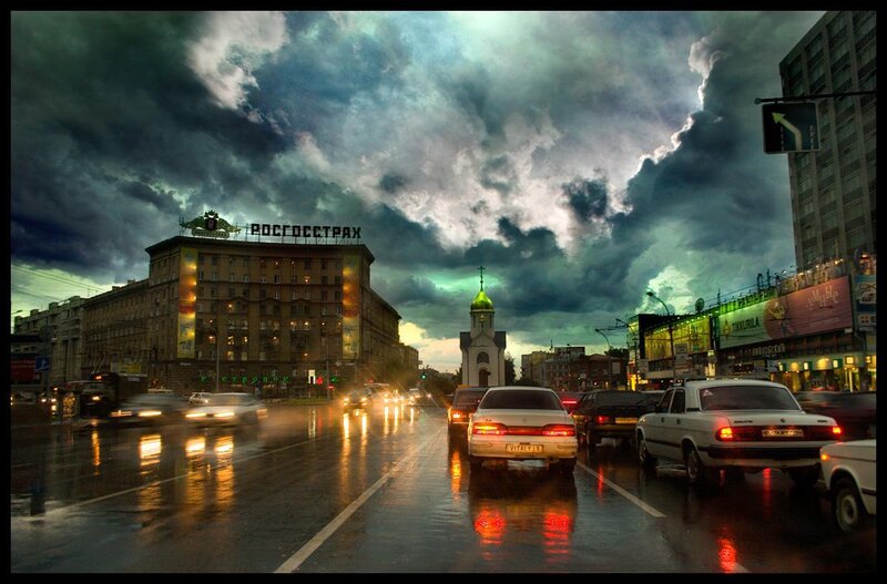 Stormy city street at dusk