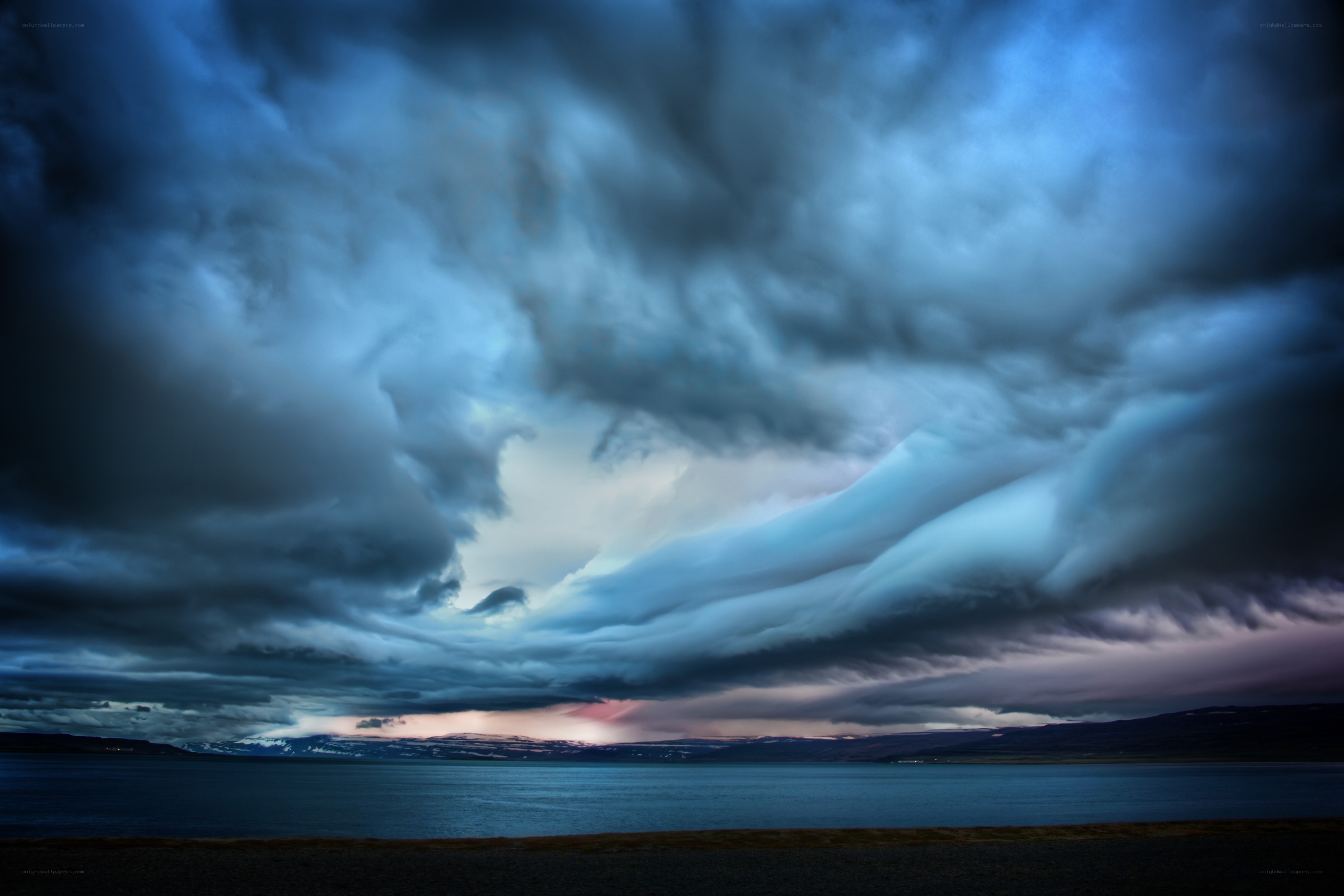 Stormy clouds over a calm sea