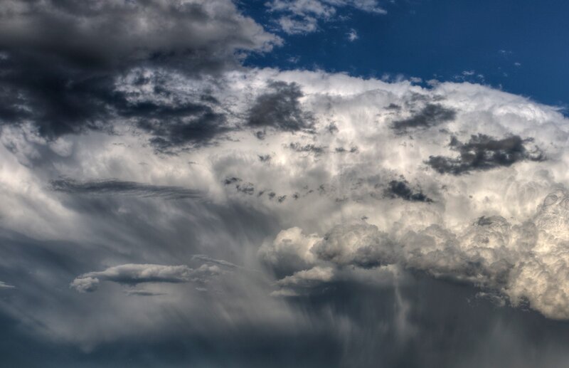 Stormy clouds over blue sky