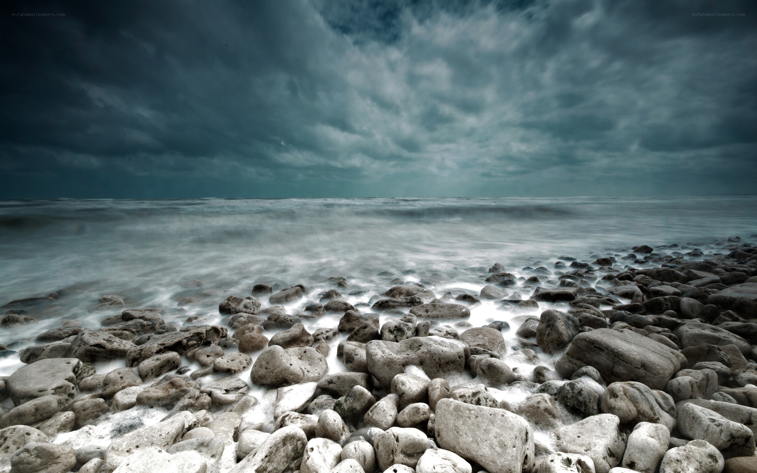 Stormy coast with pebbles
