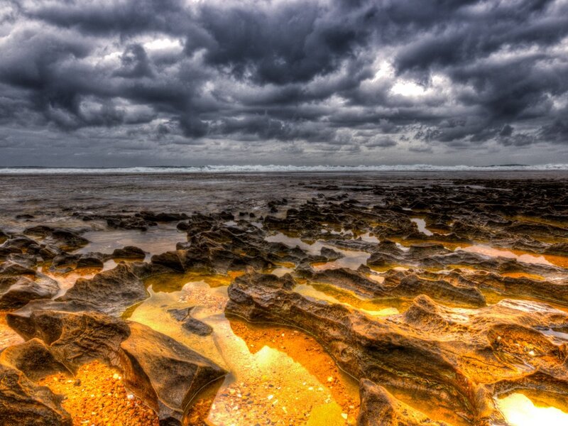Stormy coast with rocky tide pools