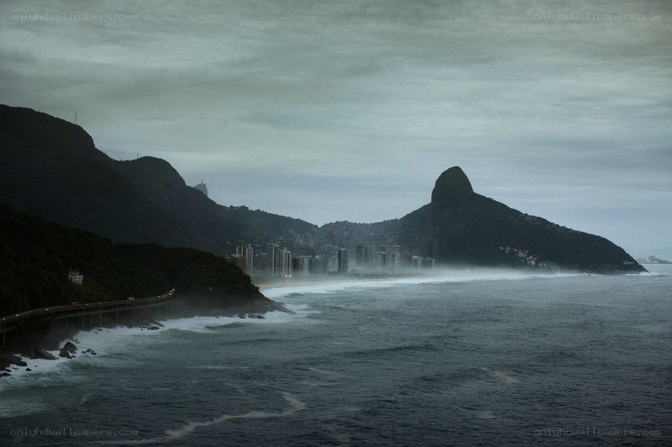 Stormy coast with Sugarloaf Mountain