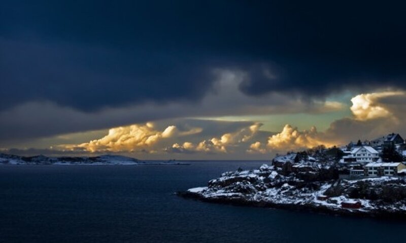 Stormy coastal landscape at dusk
