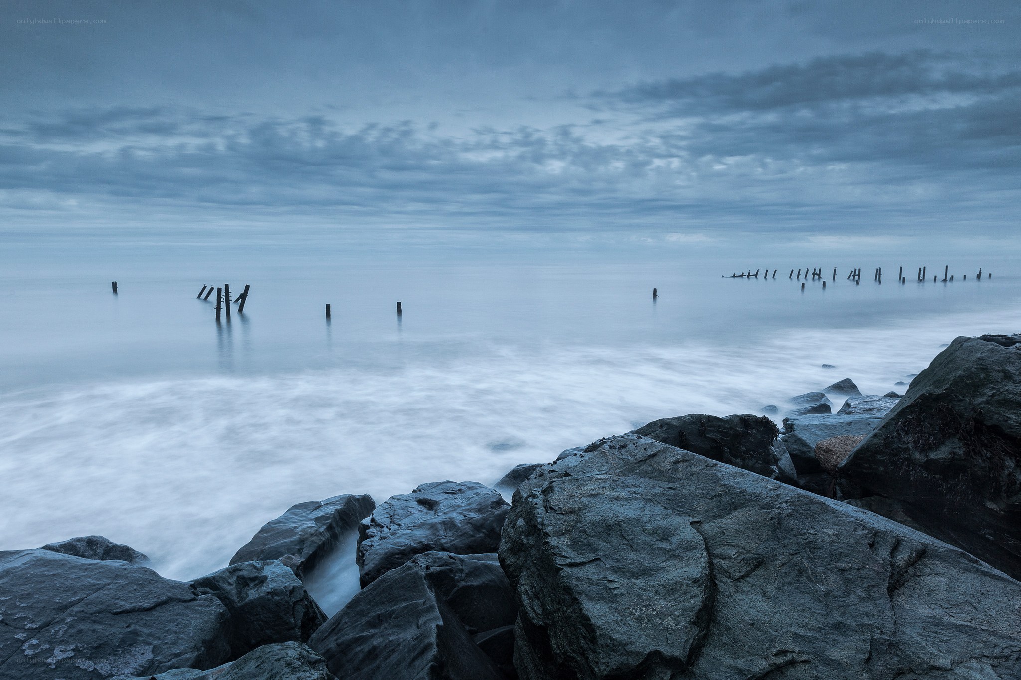 Stormy coastal rocks and sea