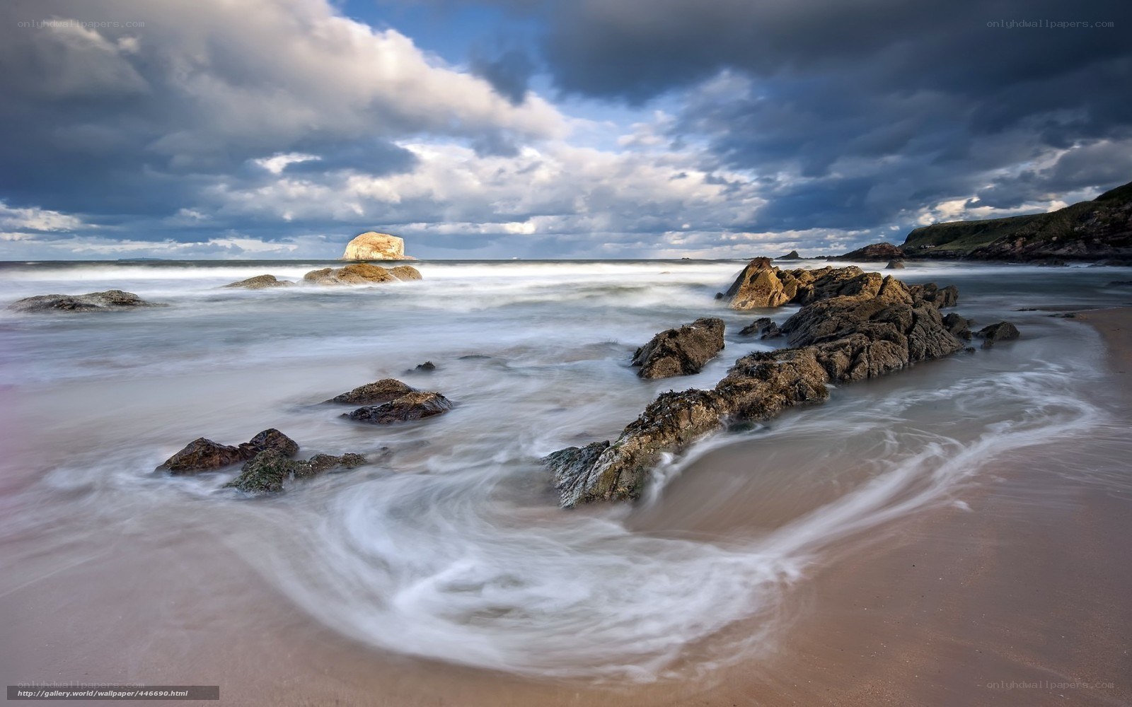 Stormy coastal rocks and waves