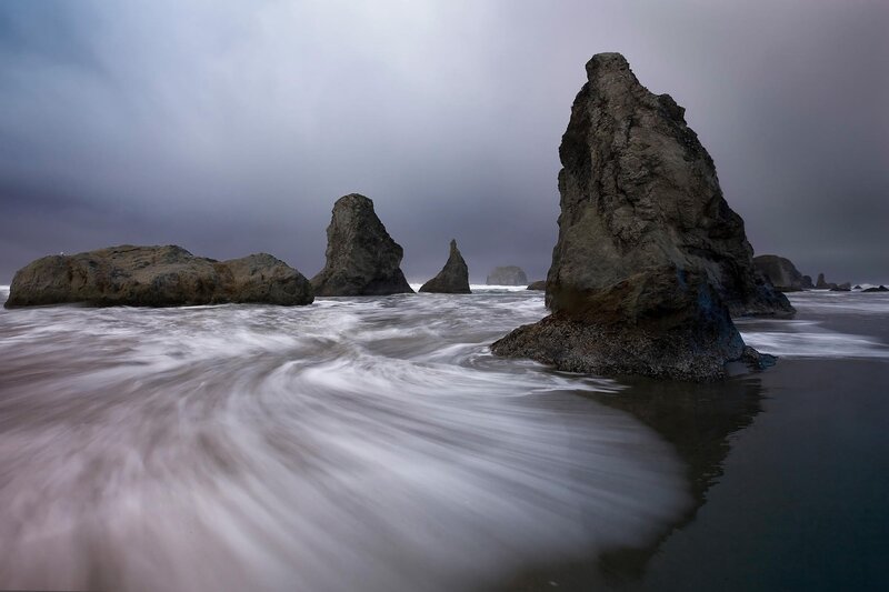 Stormy coastal rocks and waves