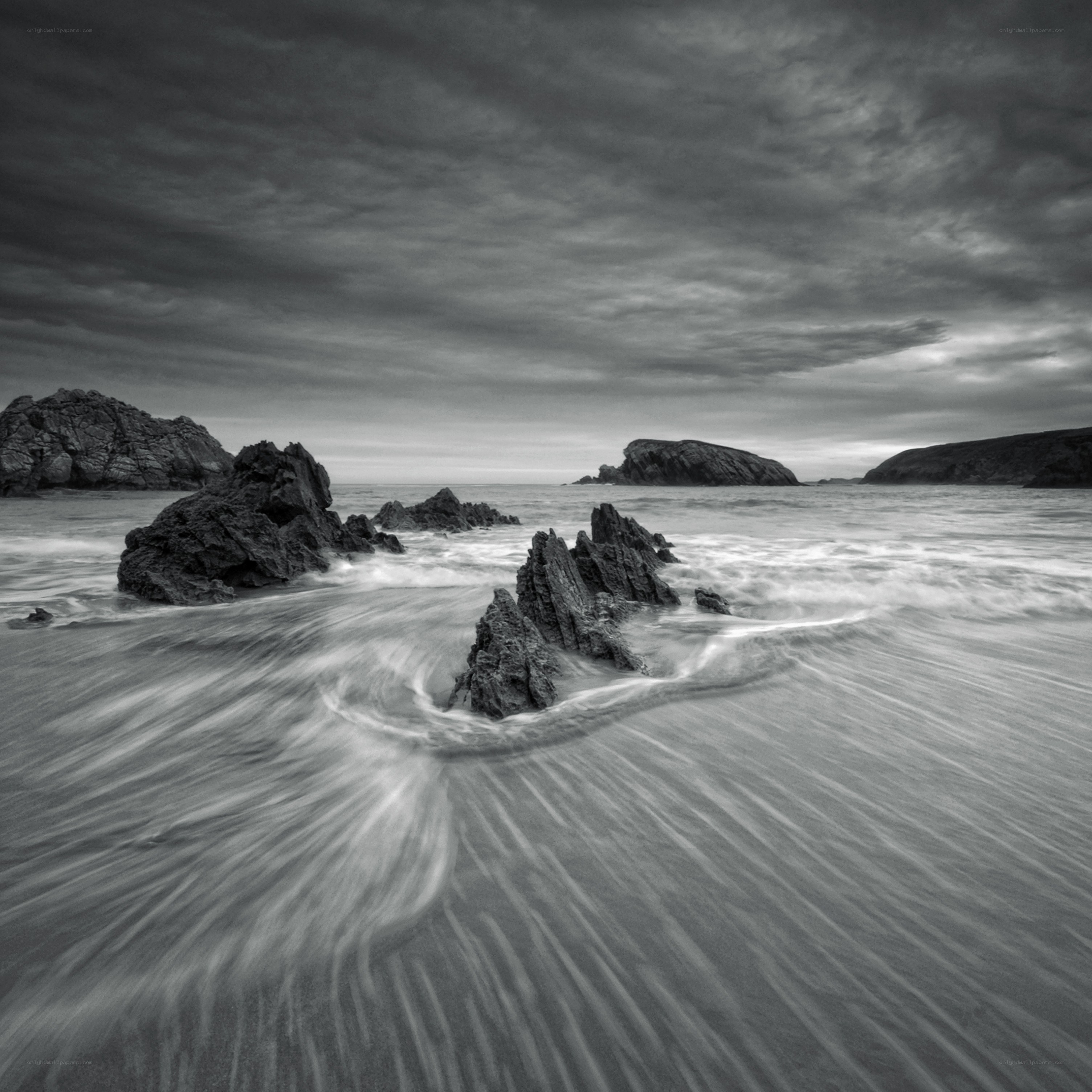 Stormy coastal rocks and waves