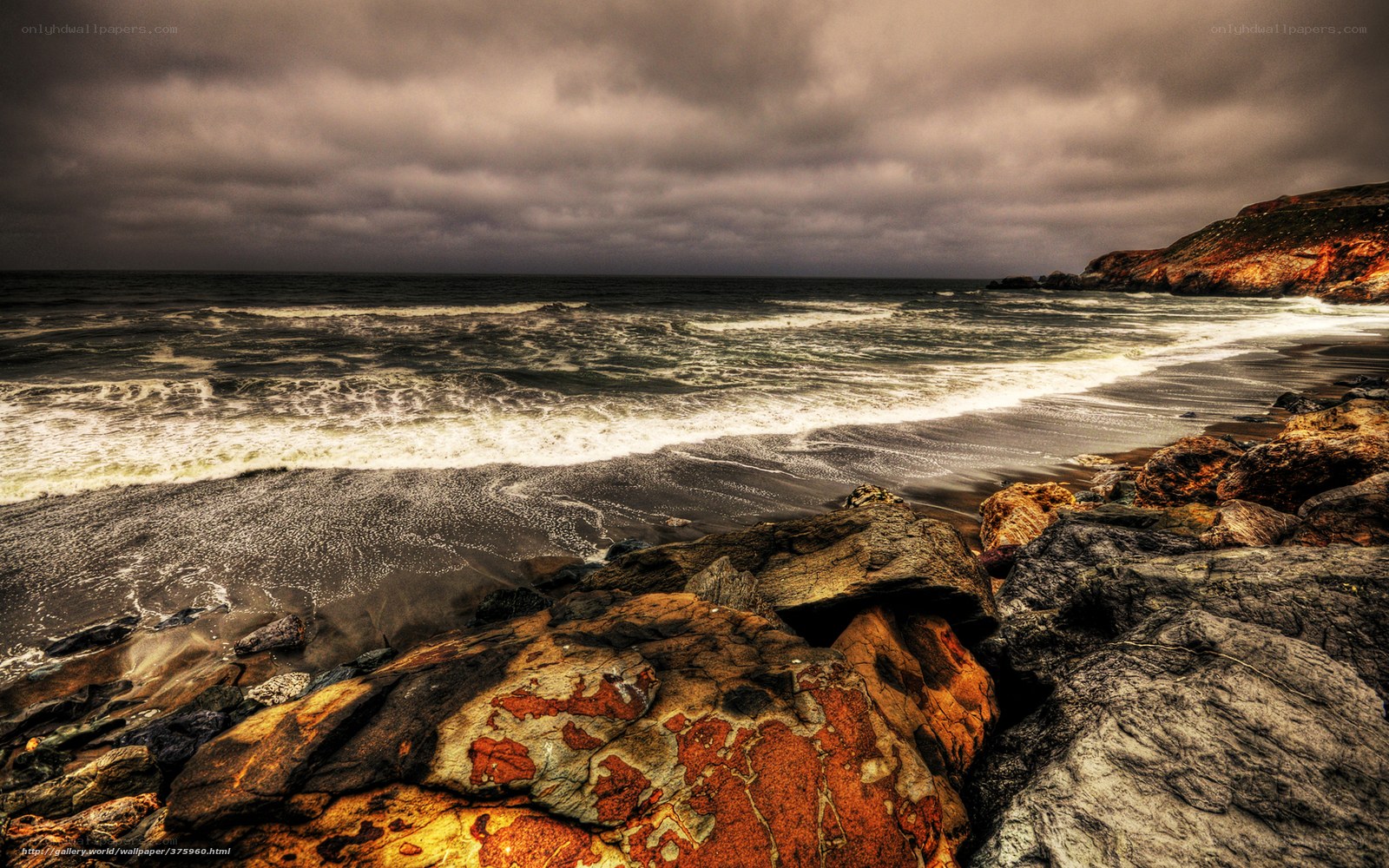Stormy coastal rocks and waves