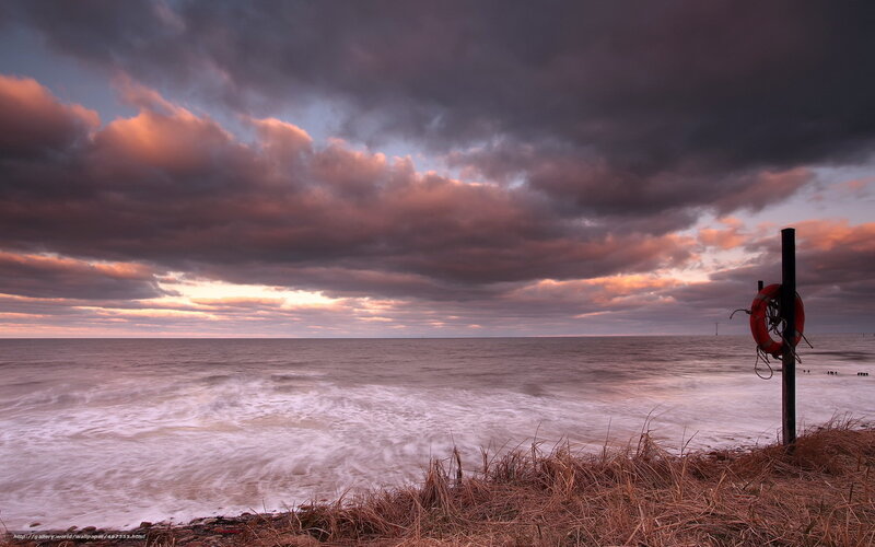 Stormy coastal sunset