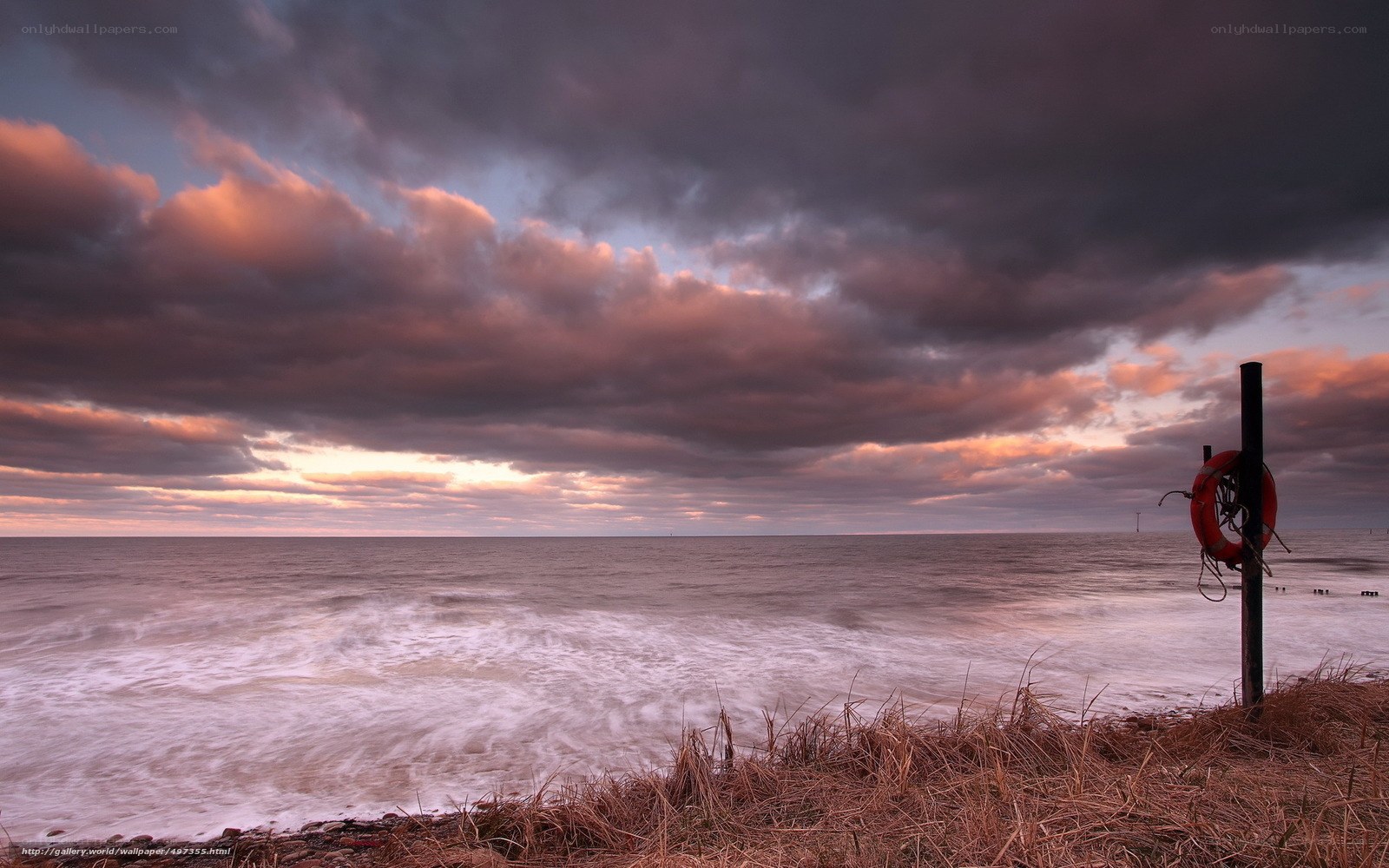 Stormy coastal sunset