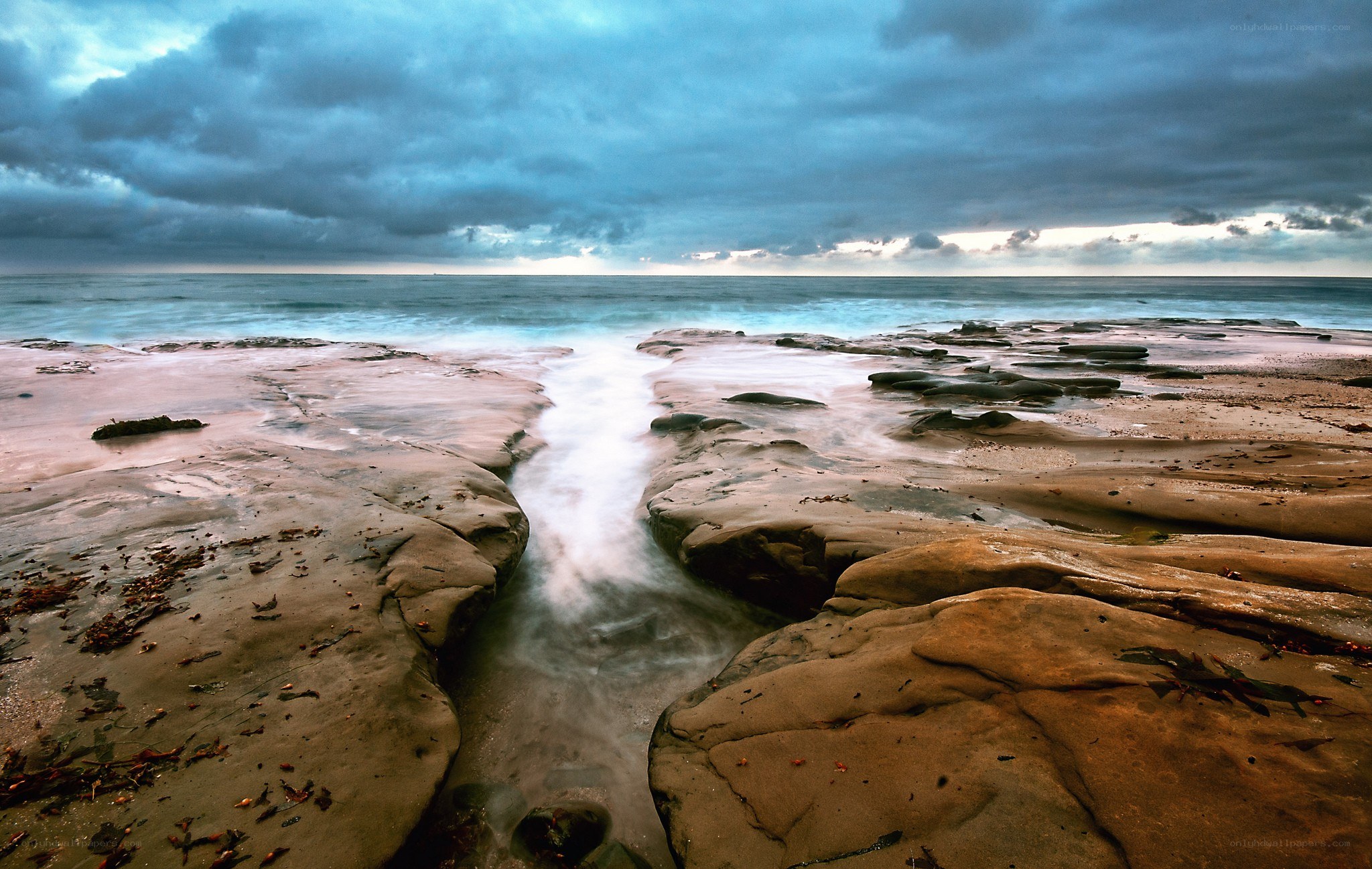 Stormy coastal tide pools