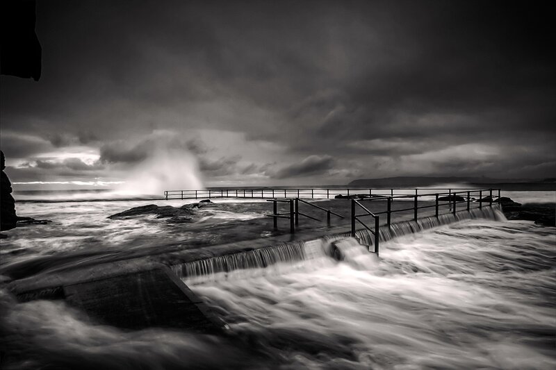 Stormy coastal waters at dusk