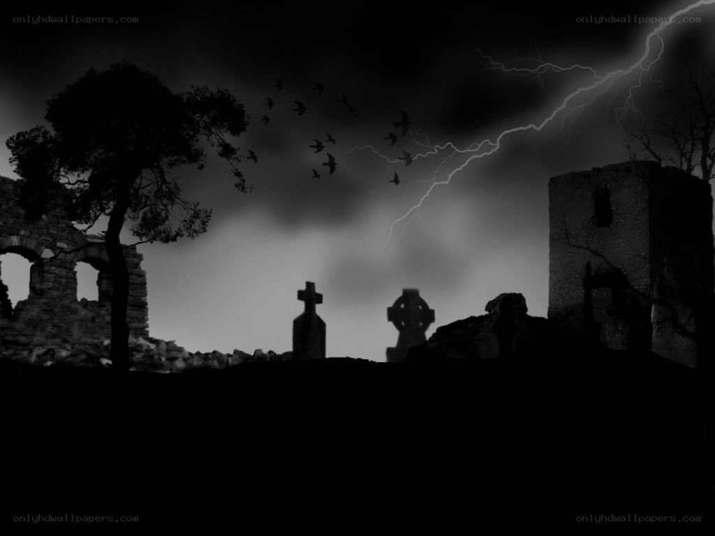 Stormy graveyard at night