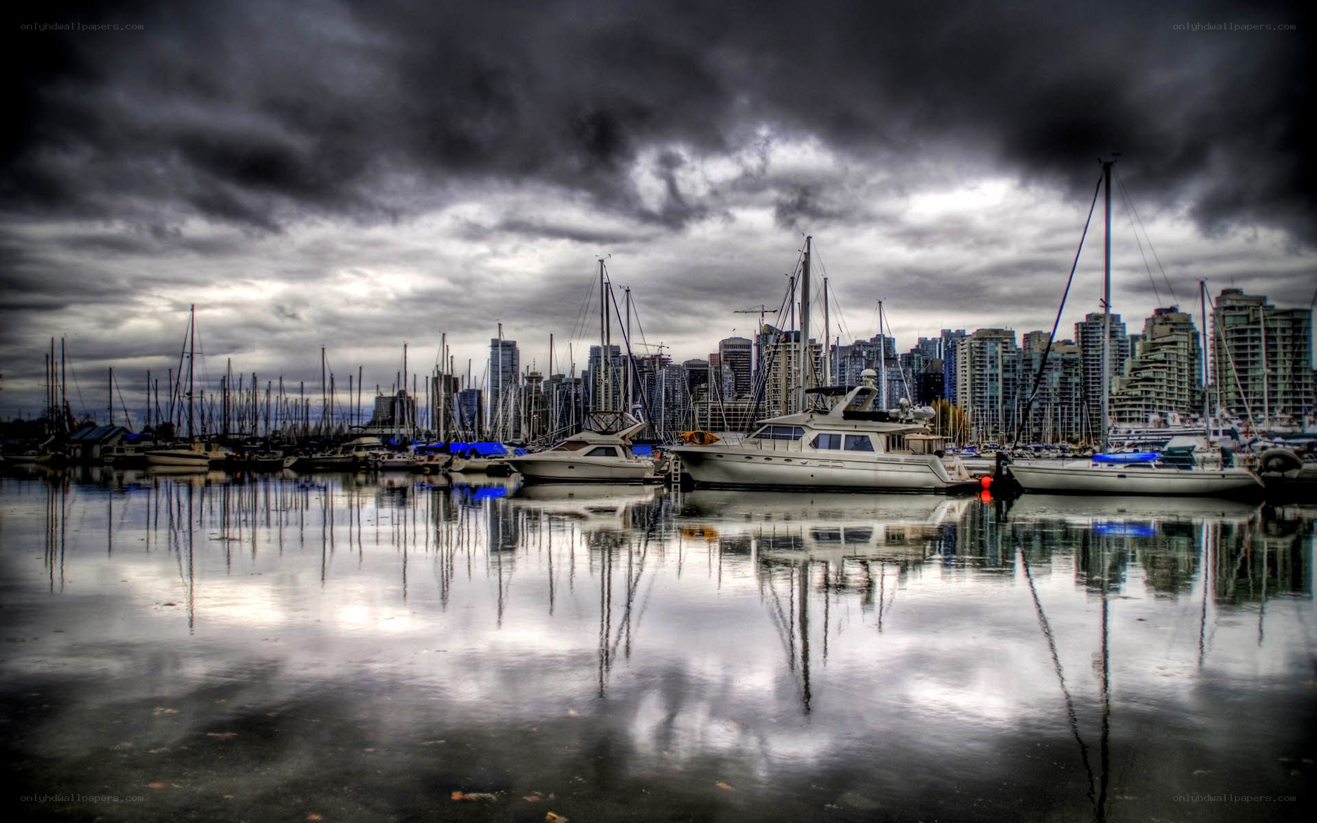 Stormy harbor with city skyline