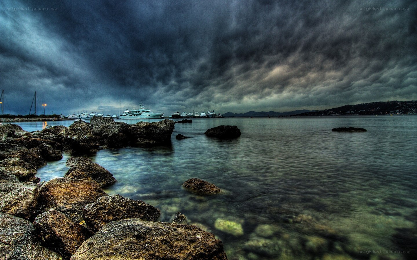 Stormy harbor with yachts