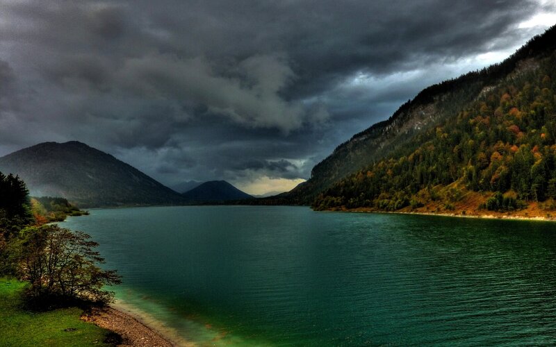 Stormy lake in mountain valley