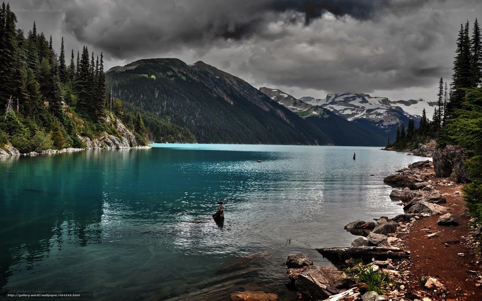 Stormy lake in mountain valley