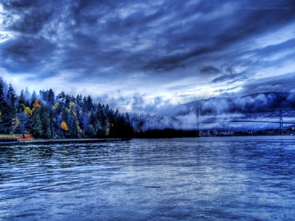 Stormy lake with bridge view