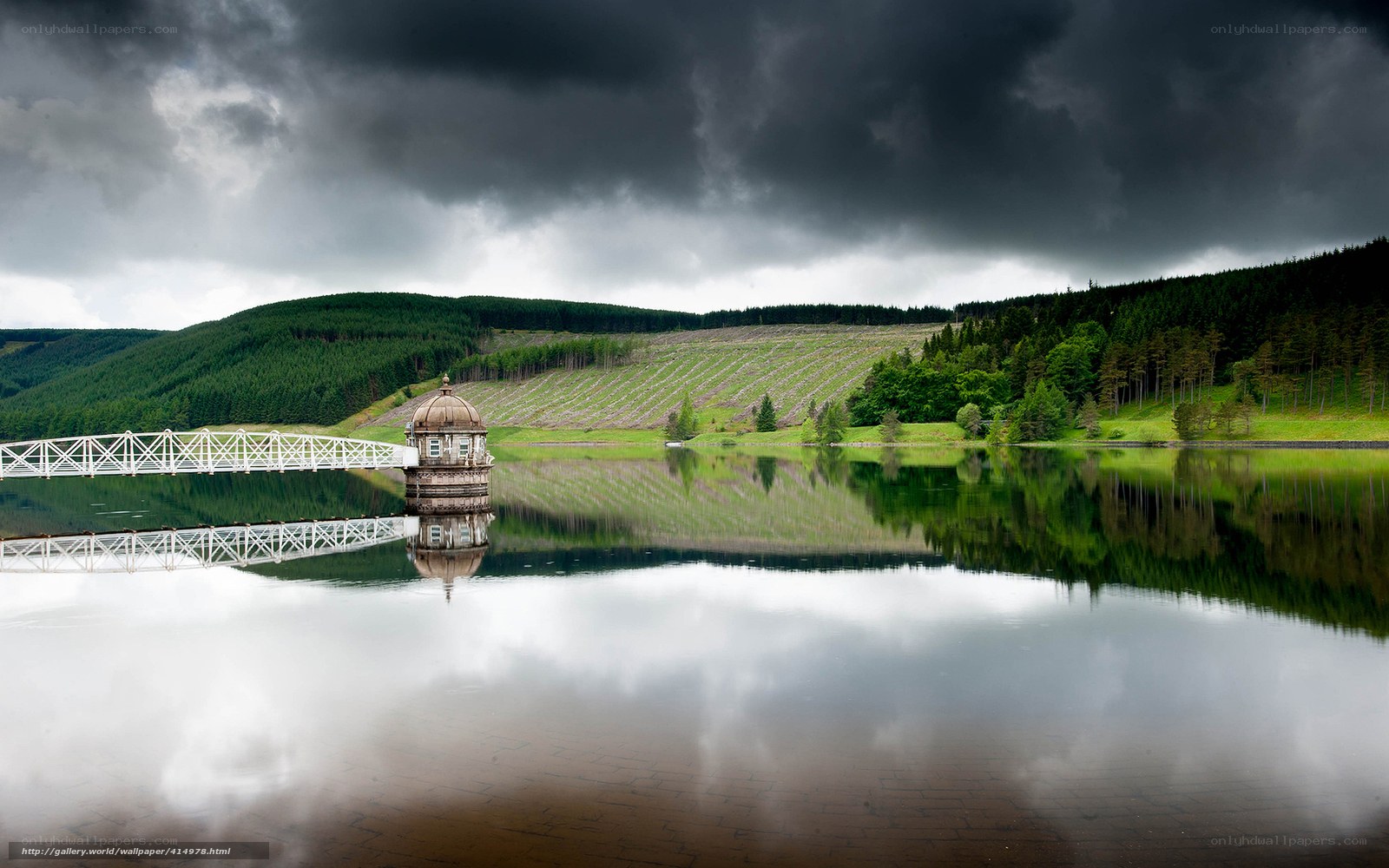 Stormy lake with dam