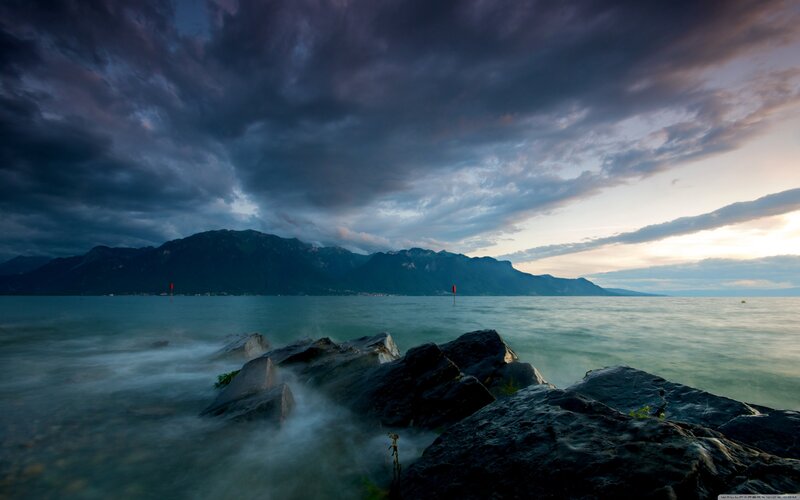 Stormy lake with mountains