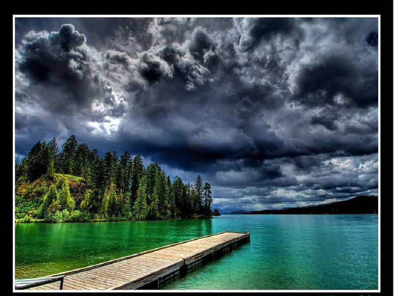 Stormy lake with wooden dock