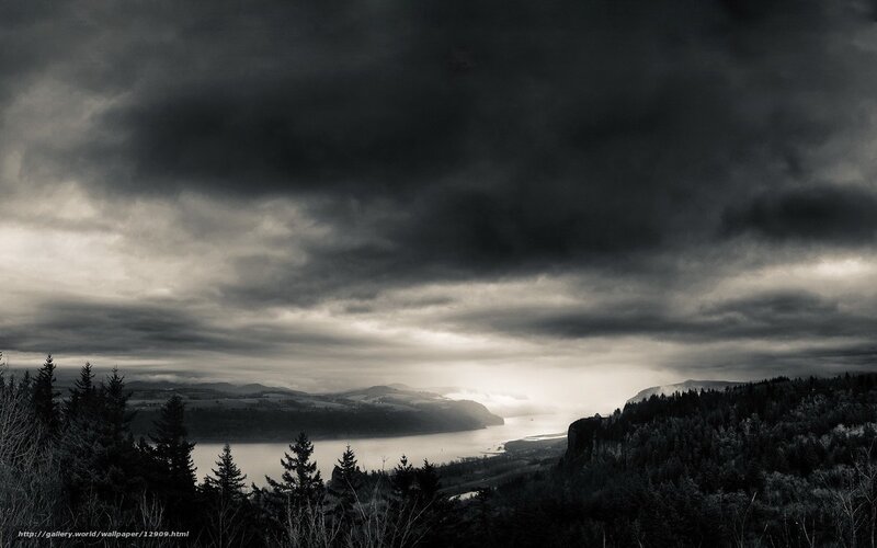 Stormy landscape over river