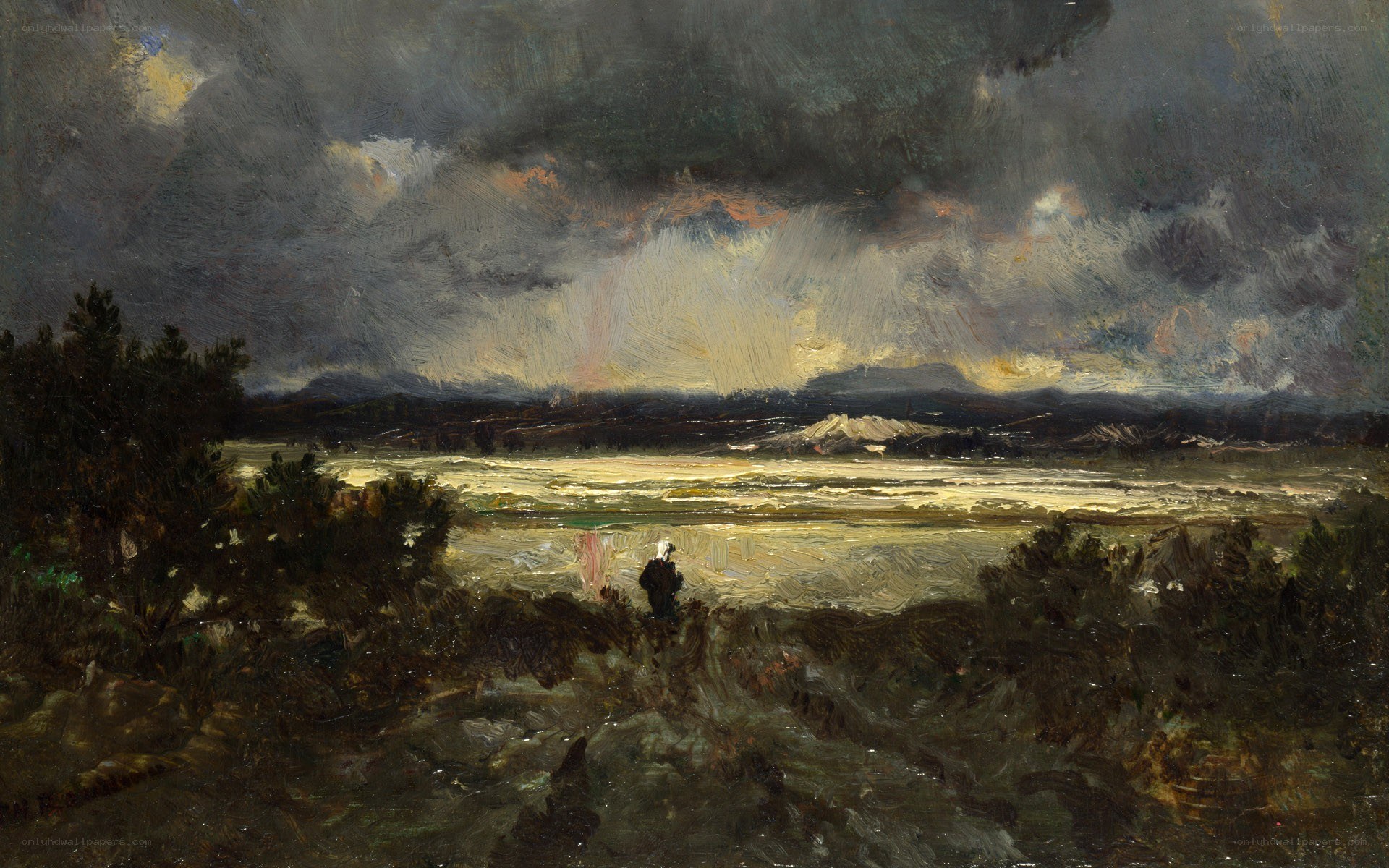 Stormy landscape with lone figure