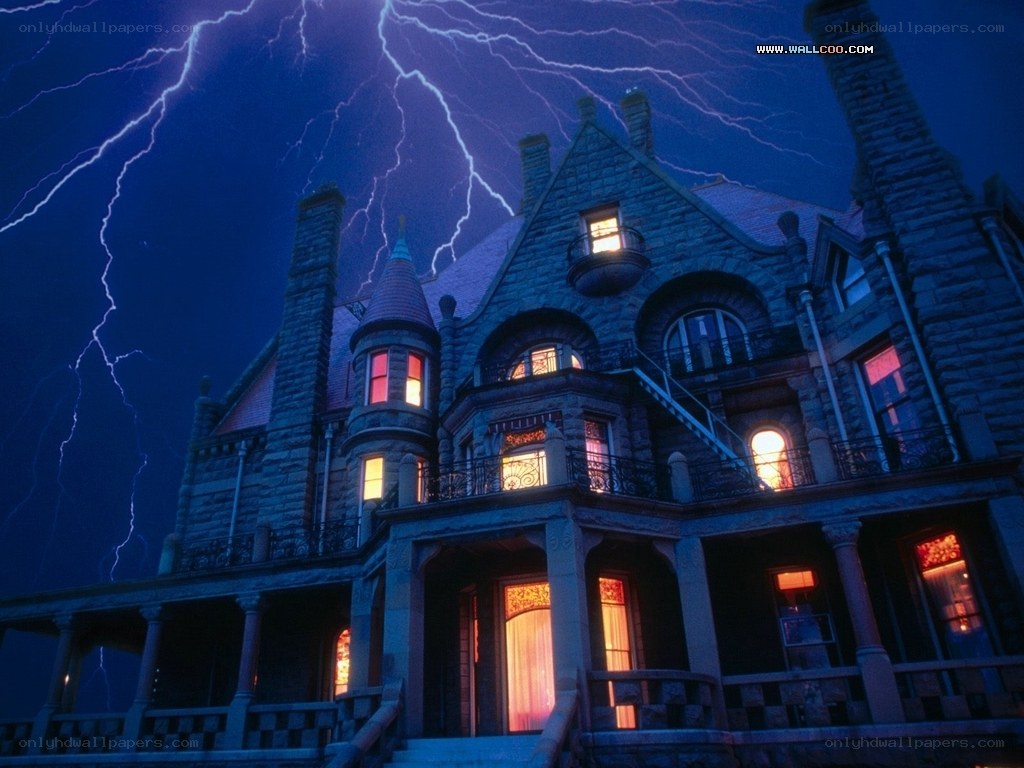Stormy mansion at night