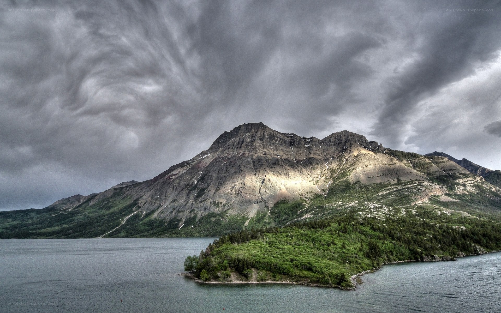 Stormy mountain lake landscape
