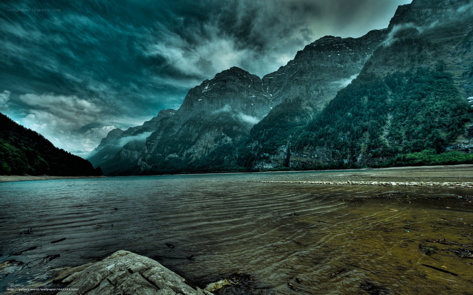 Stormy mountain lake landscape