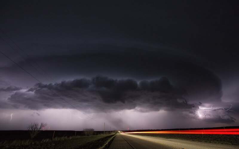 Stormy night over a rural road
