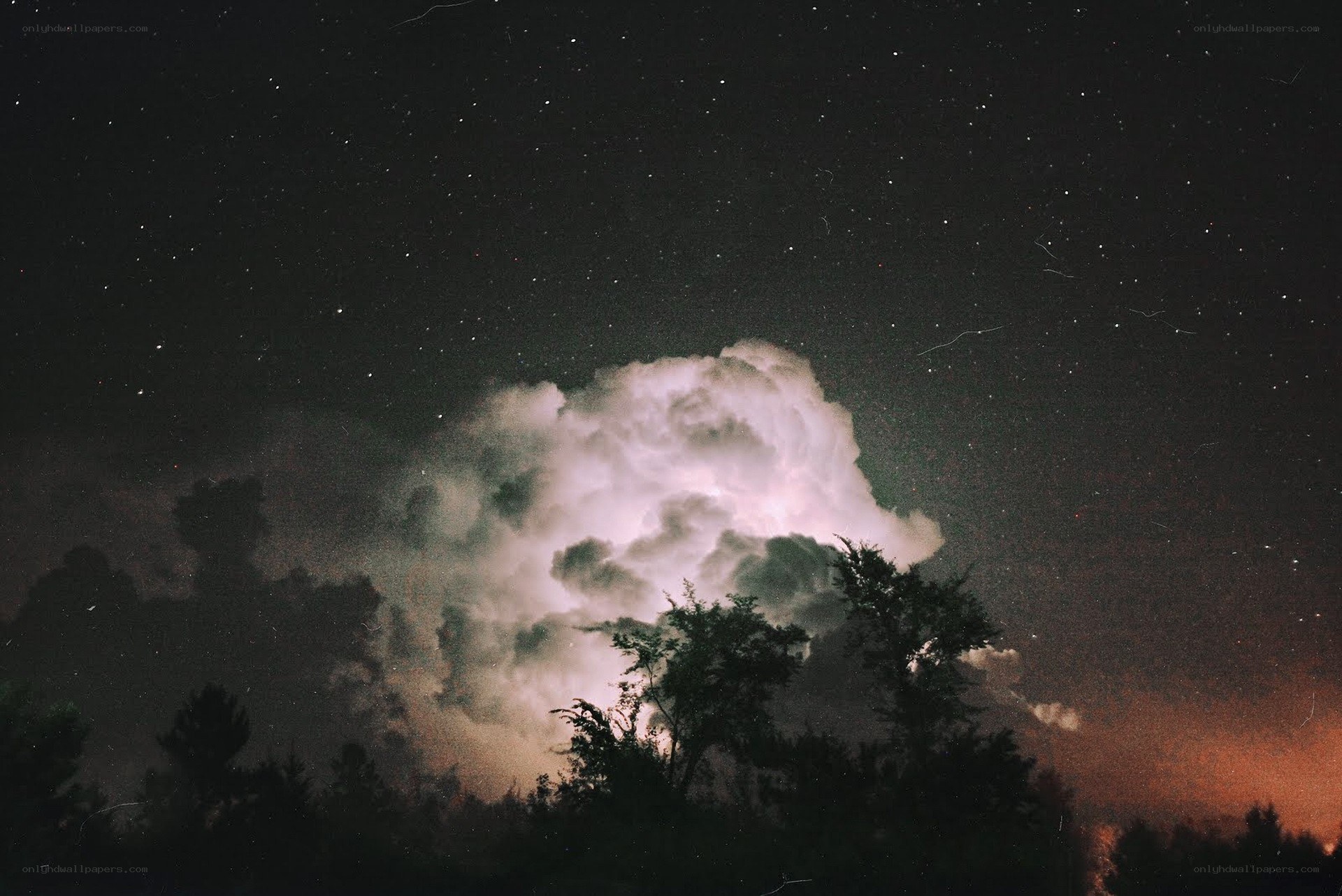 Stormy night sky with stars