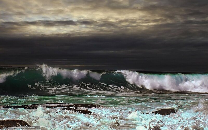Stormy ocean waves at dusk