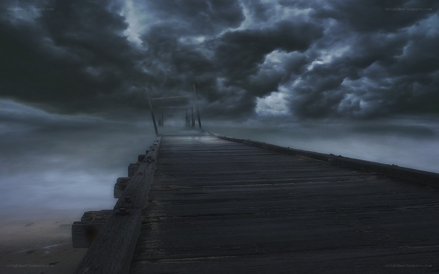 Stormy pier at dusk