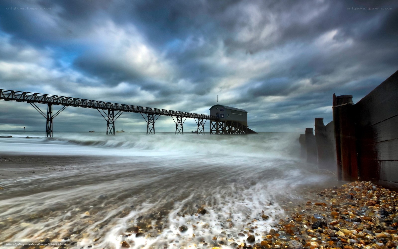 Stormy pier at the beach