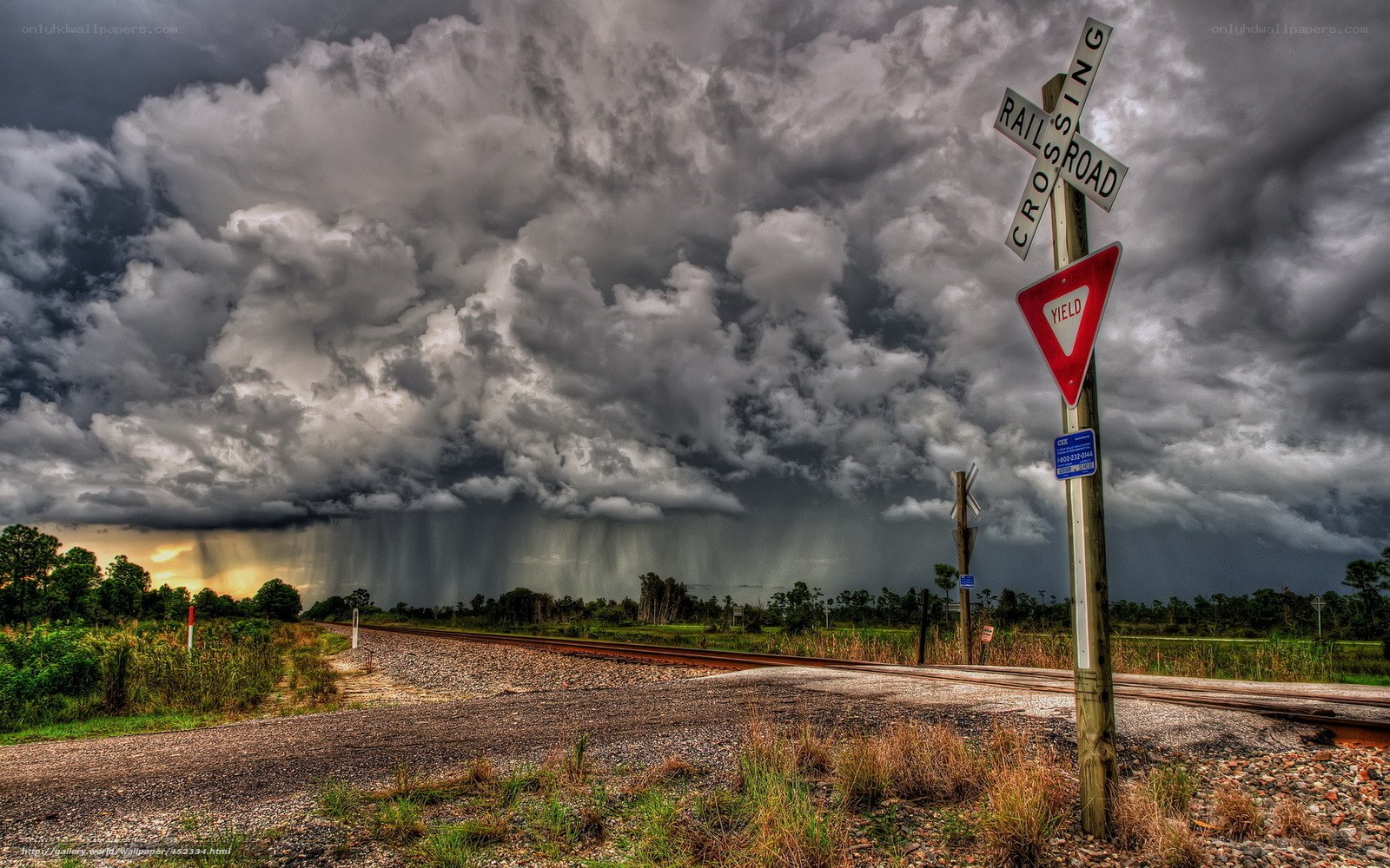 Stormy railroad crossing