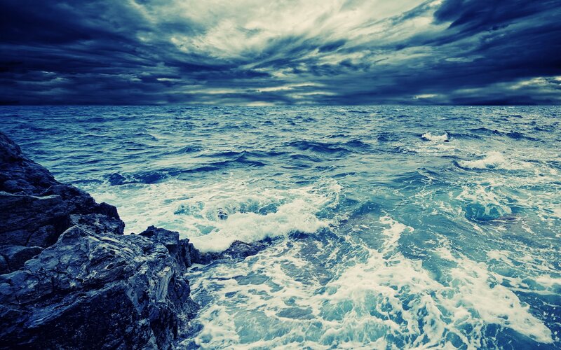 Stormy sea at rocky coast