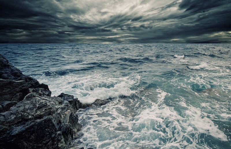 Stormy sea at rocky coast