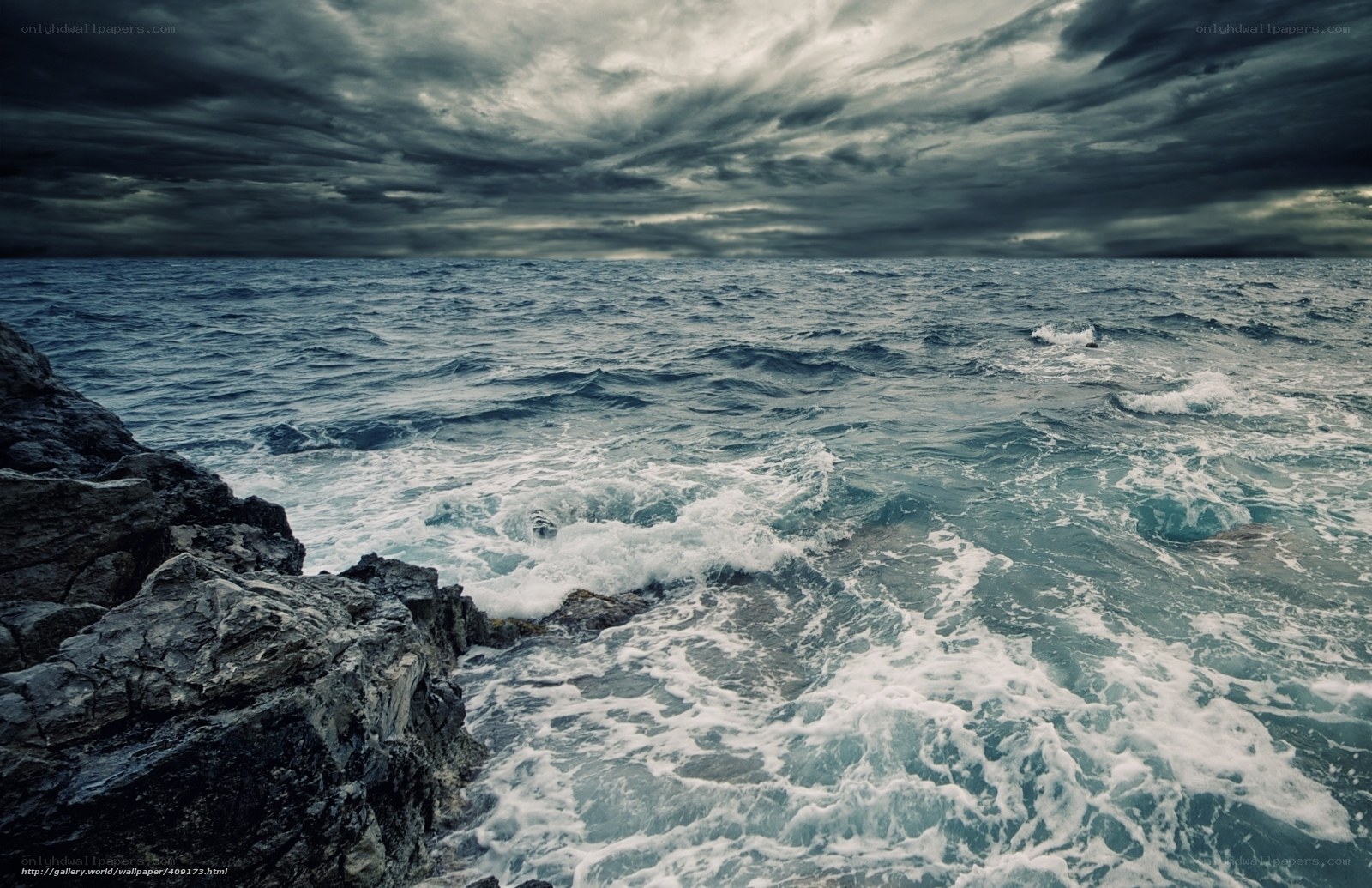 Stormy sea at rocky coast